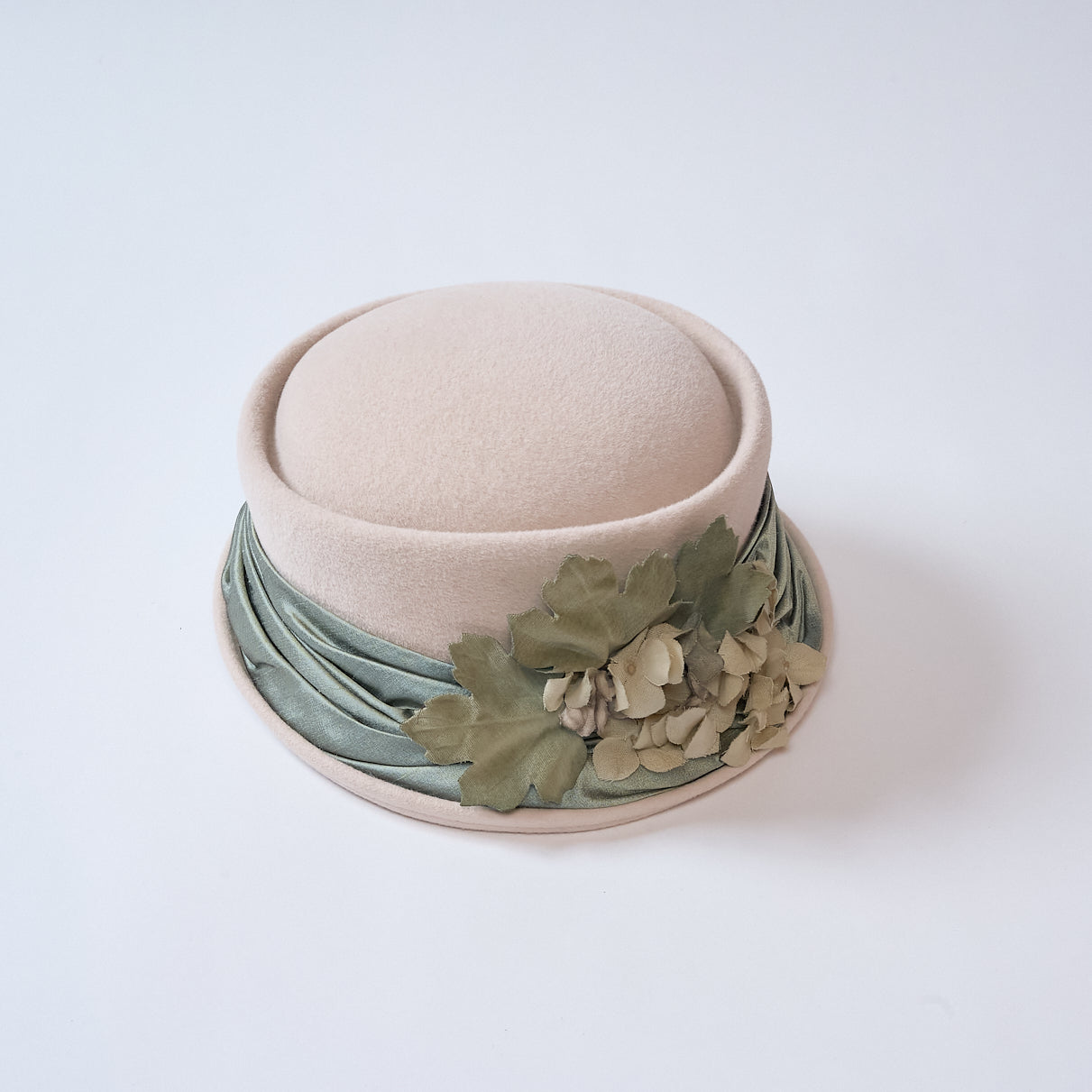 Velvet hat with flower decoration