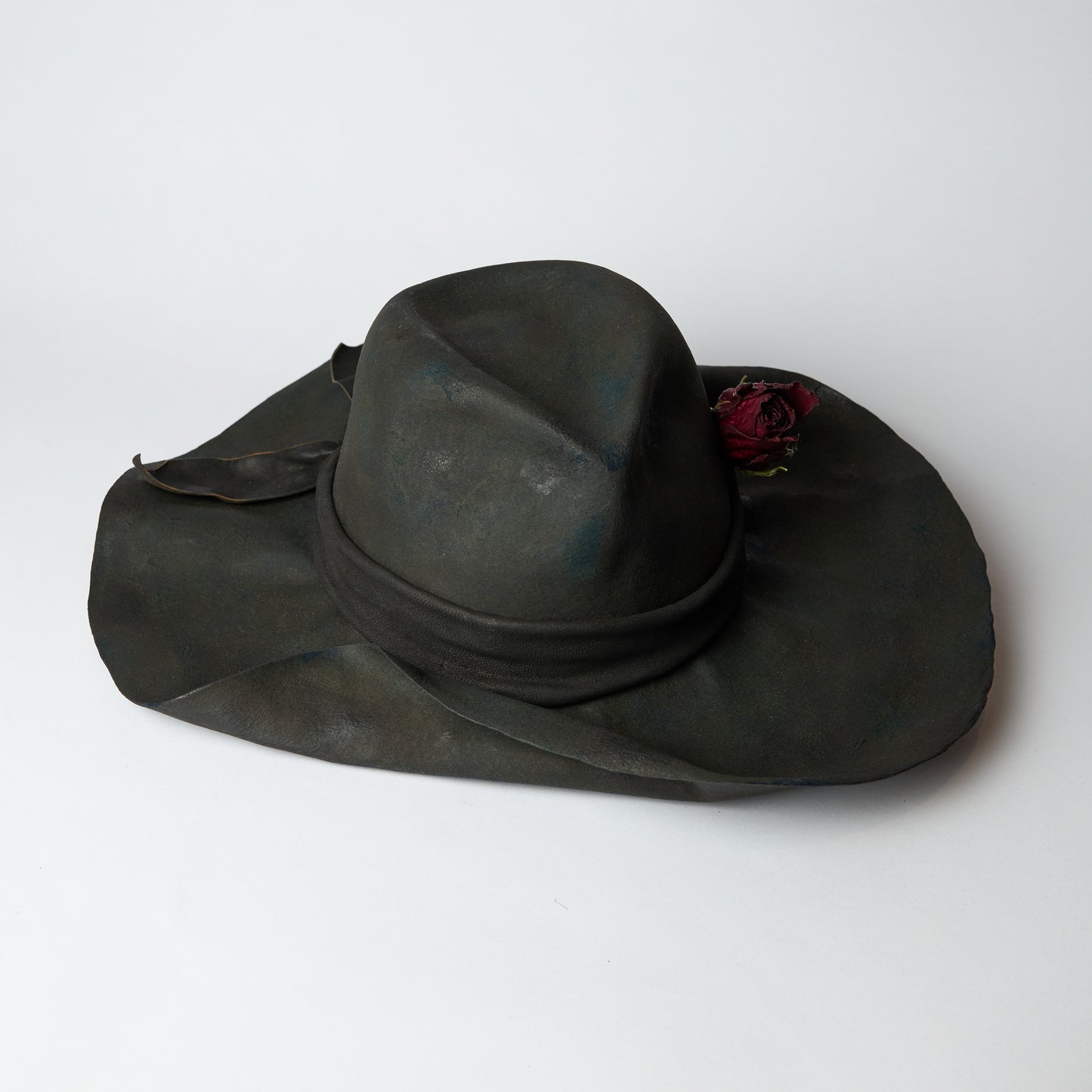 Folded brim burnt fedra hat