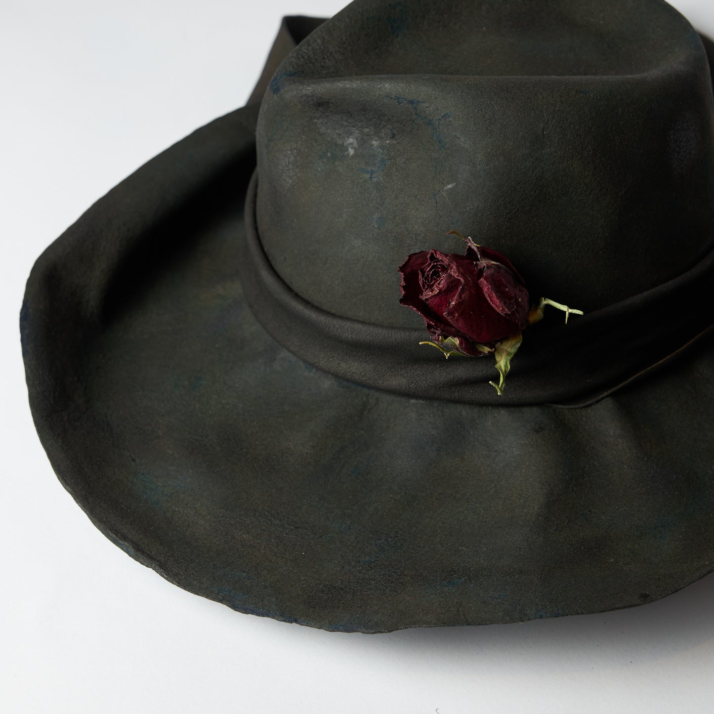 Folded brim burnt fedra hat