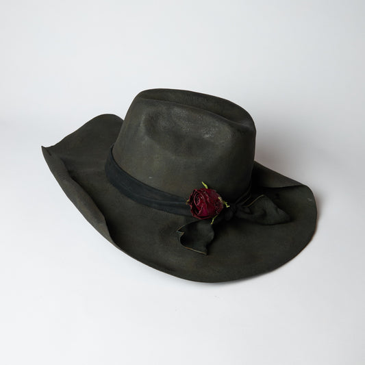 Rolled up brim burnt western hat