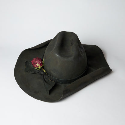 Rolled up brim burnt western hat