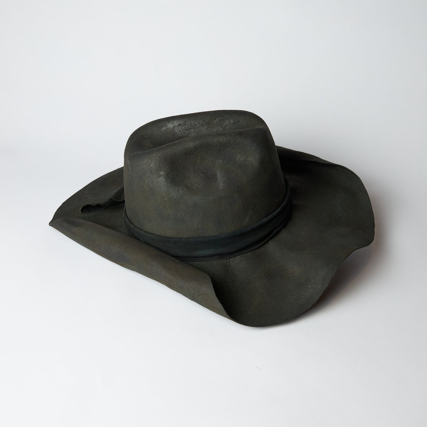 Rolled up brim burnt western hat