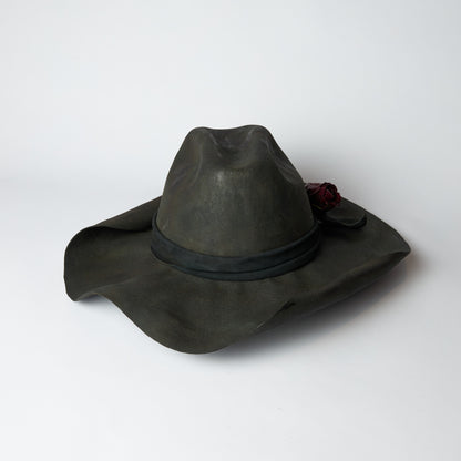 Rolled up brim burnt western hat